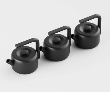 Açık gri arka planda yatay sırada üç siyah çaydanlık sergilenir. Su ısıtıcıları şekil ve boyut olarak benzer, her biri yuvarlak gövdeli ve saplı. Aydınlatma eşit, güçlü gölgeler bırakmıyor, ve görüntü iyi düzenlenmiş. T