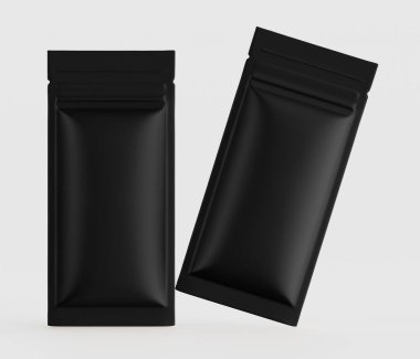 İki özdeş siyah, mat, dikdörtgen kesesi açık gri arka planda sergileniyor. Kese düz ve düzgün bir dokuya sahip ve muhtemelen plastik ya da folyodan yapılmış gibi görünüyor. Paketleme stili modern ve 