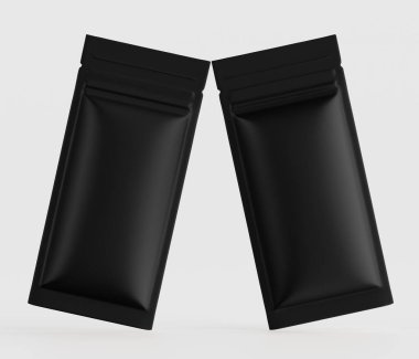 İki özdeş siyah, mat, dikdörtgen yiyecek paketleme kesesi tarafsız bir arkaplanda sergileniyor. Keseliler çapraz yönelimli, hafif bir çakışma var, bu da ürün sunumunu akla getiriyor. Esnek bir maddeden yapılmış gibi görünüyorlar, maté materyali.