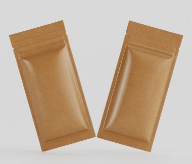 Bir stüdyo ortamında iki açık kahverengi, dikdörtgen yiyecek paketleme kesesi gösterilir. Keseler hafif yansıtıcı yüzeyi olan parlak bir maddeden yapılmış gibi görünüyor. Fermuarlı bir kapanışları var ve öyle bir pozisyondalar ki...