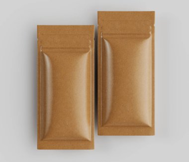 İki açık kahverengi, dikdörtgen yiyecek kesesi genel bir perspektiften sergilenir. Keselerin pürüzsüz, hafif parlak bir yüzeyi ve mühürlü fermuar gibi bir kapağı var. Keseliler birbirlerine paralel konumdalar ve tarafsız, hafif bir yerde dinleniyorlar.