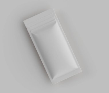 Beyaz, dikdörtgen yiyecek ambalajının stüdyo fotoğrafı. Paket düz, ince bir kese, pürüzsüz, parlak yüzeyleri var ve görünür bir logo, metin ya da tasarım unsurları yok. Paketler tarafsız, açık gri bir yüzeye yerleştiriliyor. Işıklar parlak. 