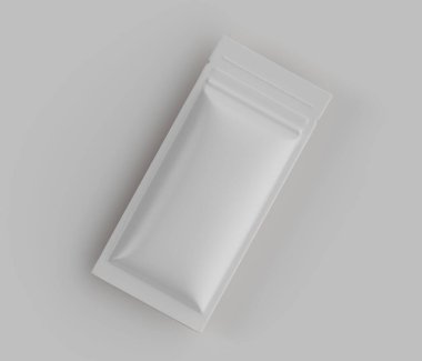 Beyaz dikdörtgen bir kesenin üstünden. Kese esnek bir malzemeden yapılmış gibi görünüyor ve fermuarı da kapalı. Pürüzsüz, mat bir yüzeyi var. Görüntü, tarafsız ve açık gri bir arkaplan ile iyi aydınlatılmış. Dekor kapalı, muhtemelen bir s