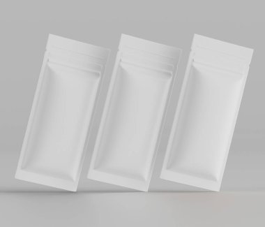 Tarafsız, açık gri bir arkaplanda hareket ve derinlik hissi vermesi için üç boş, beyaz, esnek çanta veya paket sergilenir. Poşetler ya da paketler pürüzsüz, mat bir malzemeden yapılmış gibi görünüyor, temiz çizgilerle. Işıklandırma çok...