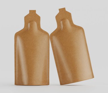 İki açık kahverengimsi, esnek kese, ya da pürüzsüz desenli keseler, tarafsız bir arkaplan üzerine kurulu bir stüdyoda sunuluyor. Dar bir kapağı ve biraz daha geniş bir gövdesi olan küçük şişeler gibi tasarlanmışlardır. Kese EMP 'ye benziyor.