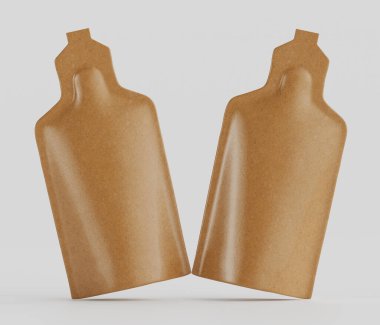 Açık gri arka planda iki açık kahverengi kese sunuluyor. Pürüzsüz, esnek bir maddeden yapılmış ve küçük şişeleri andıran benzer bir şekli var. Keseliler dinamik bir pozisyonda yerleştirilmiş, bu da bir mot hissi uyandırıyor.