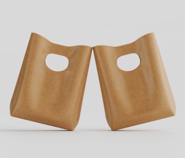 Tarafsız bir arkaplanda iki açık bej, kağıt benzeri alışveriş torbası sergileniyor. Poşetler yan yana, hafif açılı bir sunumla denge ve denge hissi yaratıyor. Torbaların basit, yapılandırılmış bir şekli var.