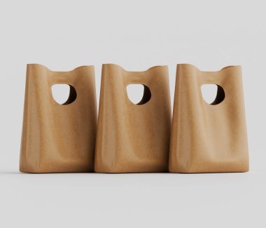 Bir stüdyo ortamında üç tane bronz renkli alışveriş çantası sergileniyor. Çantalarda eşsiz, yontulmuş bir tasarım ve pürüzsüz, deri benzeri bir yüzey var. Çantalar yatay olarak nötr bir çizgide dizilmiştir.