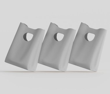 Dijital olarak hazırlanmış, stüdyo ortamında üç adet açık gri plastik alışveriş torbası gösteriliyor. Çantalar biraz çapraz, dinamik bir düzende yerleştirilmiş, görsel bir ilgi yaratıyor. Poşetler pürüzsüz ve basit, temiz kesikler. Neut.