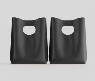 İki özdeş siyah plastik alışveriş torbası, tarafsız gri arka planlı bir stüdyo ortamında sunuluyor. Poşetlerin basit bir tasarımı var. Kesme sapları ve pürüzsüz bir kapağı var. Işıklandırma eşit ve göze çarpmıyor. 