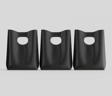 Tarafsız gri arka planda aynı şekildeki üç alışveriş torbası sunuluyor. Poşetler düz, minimalist tarzda yapılmış, pürüzsüz bir dokuya sahip. Koyu siyah renkteler, üstlerinde de kesme sapı var. Çantalar hizalandı.