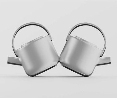 Bir stüdyo ortamında üç modern sulama kutusu gösteriliyor. Teneke kutuların açık gri, metalik bir görünüşü var..