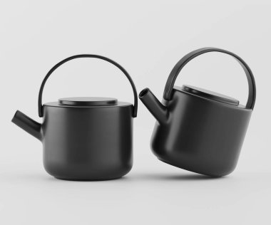 Açık gri arka planda iki siyah çaydanlık sunuluyor. Tencereler görsel olarak benzer, yuvarlak vücutlar ve aynı tutamaklar var. Tasarımda modernler, minimalist bir tarzı var. Aydınlatma eşit ve parlak. 