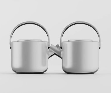 İki uyumlu, modern çaydanlık bir stüdyo ortamında sunuluyor. Çaydanlıklar açık gri ya da gümüş renginde, parlak ve minimalist bir tasarım sergiliyorlar. Madde pürüzsüz ve yansıtıcı görünüyor. Bileşimi simetrik, çaydanlık pozitifti.