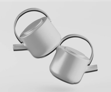 İki modern çaydanlık tarafsız bir zemine karşı havada duruyor gibi görünüyor. Çaydanlıklar açık gri renktedir ve yuvarlak, pürüzsüz kıvrımlara sahiptir. Sapları basit ve zarif ve genel tasarımı da minimalist ve temiz. Işıklar yumuşak.
