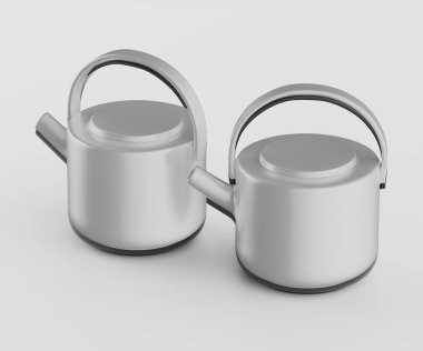 İki modern, açık gri çaydanlık bir stüdyo ortamında sunuluyor. Çaydanlıklar basit, yuvarlak bir tasarıma sahiptir ve pürüzsüz, parlak bir sonla karakterize edilir. Çaydanlıklar izleyiciye hafifçe dönük, ve ışıklandırma eşit, vurgulu.