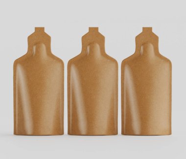 Açık gri arka planda üç özdeş kahverengi kese sergileniyor. Keselerin pürüzsüz, parlak bir görünüşü ve hafif incelmiş bir şekli var. Tek seferlik konteynırlara benziyorlar. Sıvı veya takviye için ambalaja benziyorlar. Işık eşit., 