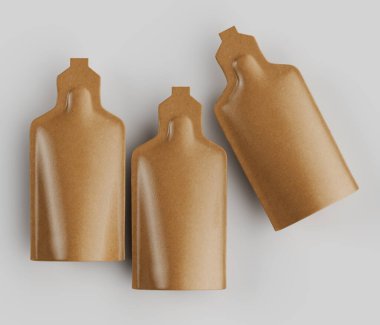 Bu resimde, nötr gri arka planda düzenlenmiş üç kahverengi, eşsiz şekilli paket var. Paketler desenli bir kağıt ya da karton malzemeden yapılmış gibi görünüyor. Bu da çevre dostu ya da doğal bir estetik olduğunu gösteriyor. Işıklandırma...