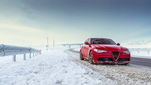 Punainen Auto Lumisella Talvitiellä Turvallisuuskäsite — kuvapankkivalokuva
