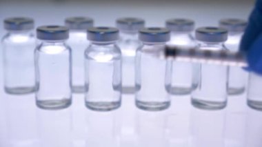 Coronavirus vaccine bottles close up