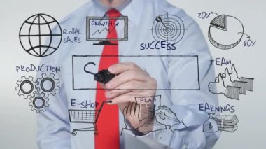 Businessman writing on glass sales
