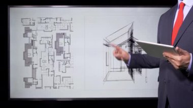 Architect Working on drawings and blueprints on monitor