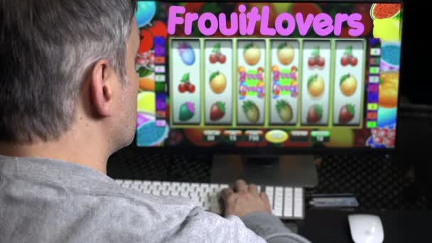 Addicted Man Playing Slot Machine Online — Stock Video