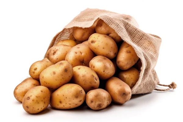 stock image Raw potatoes in burlap sack isolated on white background