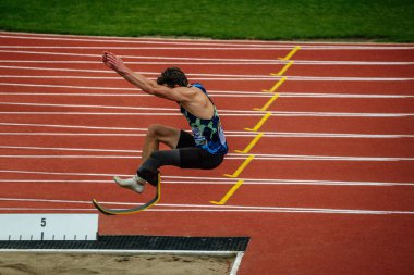 Sochi, Russia - October 5, 2022: male paraathlete long jump in competition