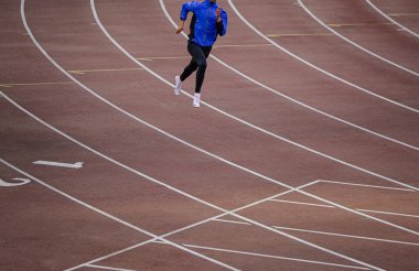 Chelyabinsk, Russia - June 4, 2022: male athlete running training in UFD Athletics Championship