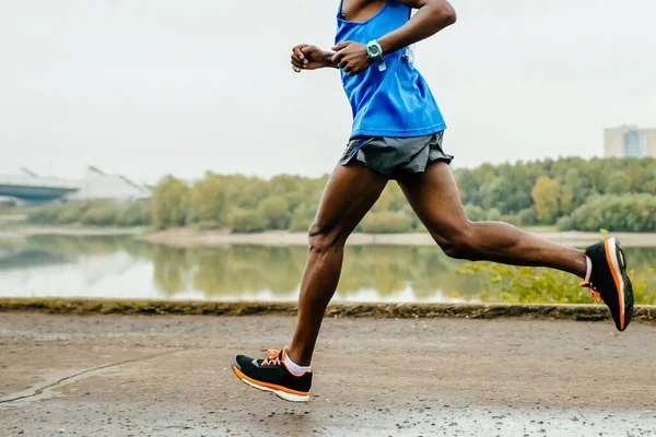 Male African Runner Athlete Running Marathon Race Embankment River Legs — Stock Photo, Image