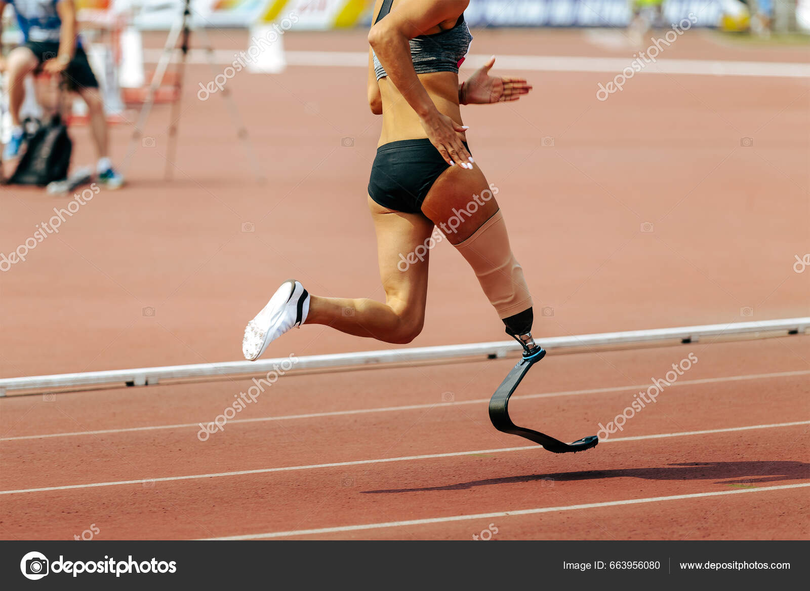 Female Para Athlete Prosthetic Leg Running Track Stadium Summer