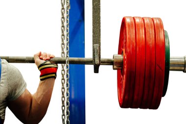 Monolit üzerinde çömelme için kolluk ve halter, beyaz arka planda izole