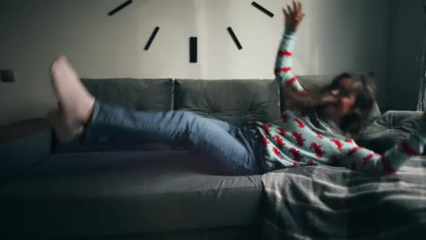 Woman Jumping Lie Couch While Celebrating Moving New Home Cheerful — Vídeo de stock