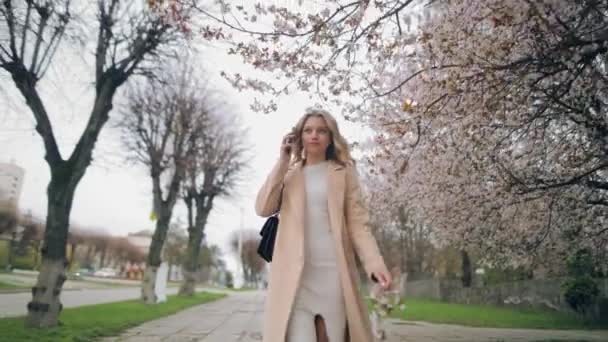 Portrait Cute Young Woman While Walking City Street Blooming Trees — Stock Video