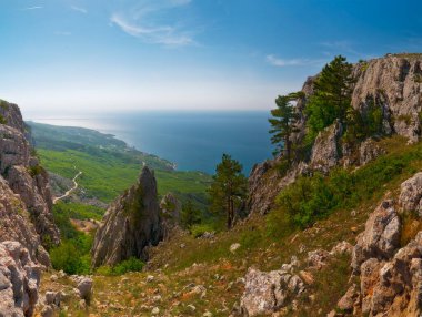 Crimea - a view from plateau. Beautiful view. The Black Sea and the ridge of the Crimean mountains.
