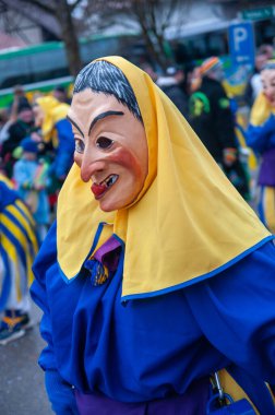 Hohenstadt - February 17, 2023: Participant of a parade in colourful costumes at the traditional carnival parade in Hohenstadt, Germany.