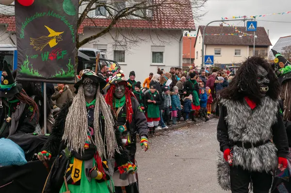 Hohenstadt - February 17, 2023: Participant of a parade with costumes and masks at the traditional carnival parade in Hohenstadt, Germany.