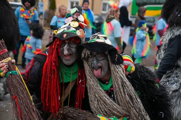 Hohenstadt - February 17, 2023: Participant of a parade with witch masks and costumes at the traditional carnival parade in Hohenstadt, Germany.