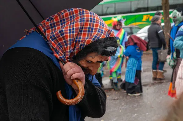 Hohenstadt - February 17, 2023: Participants of a parade with traditional costumes at the carnival parade in Hohenstadt, Germany.