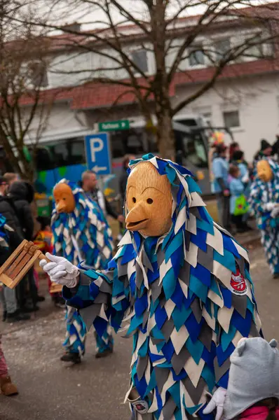 Hohenstadt - February 17, 2023: Participant of a parade with colourful costumes at the traditional carnival parade in Hohenstadt, Germany.