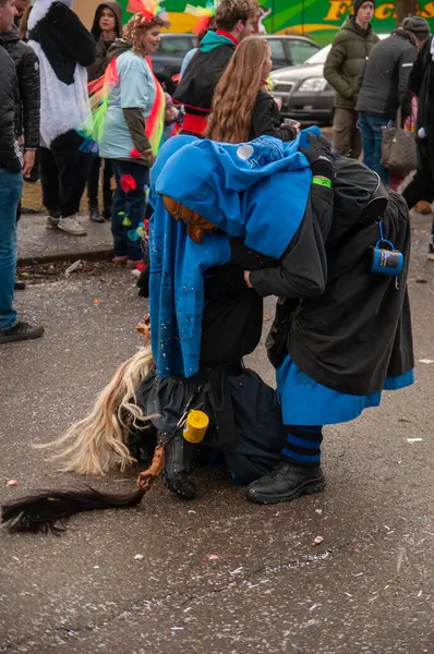 Hohenstadt - February 17, 2023: Participants of a parade with traditional costumes and masks at the carnival parade in Hohenstadt, Germany.