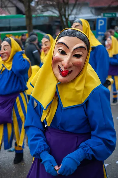 Hohenstadt - February 17, 2023: Participant of a parade in colourful costumes at the traditional carnival parade in Hohenstadt, Germany.