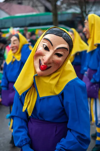 Hohenstadt - February 17, 2023: Participant of a parade in colourful costumes at the traditional carnival parade in Hohenstadt, Germany.
