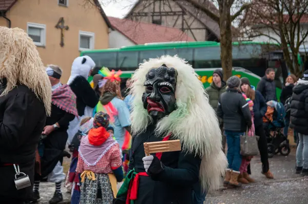 Hohenstadt - February 17, 2023: Participant of a parade in terrible mask at the traditional carnival parade in Hohenstadt, Germany.