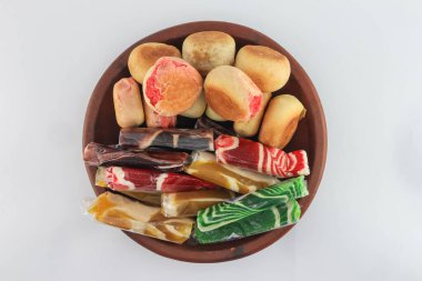 Bakpia Pathok and Dodol. food by Yogyakarta typical. served on a white background plate.