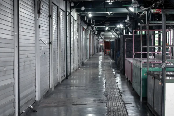 interior of a long mystical room, dimly lit hallway. old building, empty house. dark corridor. without occupants. no people. create a mystical atmosphere.