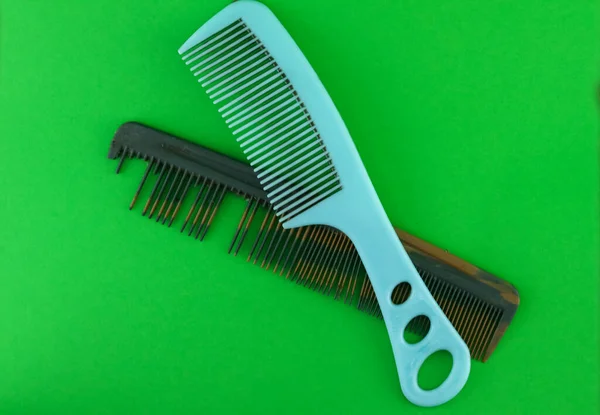 old hair comb. dirty plastic combs, old broken combs that are no longer suitable for use.