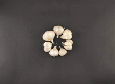 close up, garlic. herbs or spices. the main seasoning in cooking. flavor enhancer. with isolated concept, photography studio.