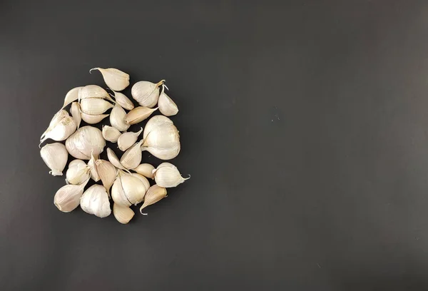 close up, garlic. herbs or spices. the main seasoning in cooking. flavor enhancer. with isolated concept, photography studio.